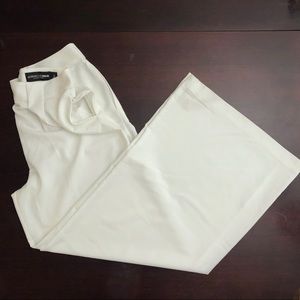 Pure white, high waisted, pants w/ pockets
